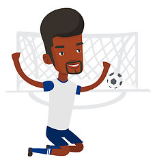 Image showing Soccer player celebrating scoring goal.