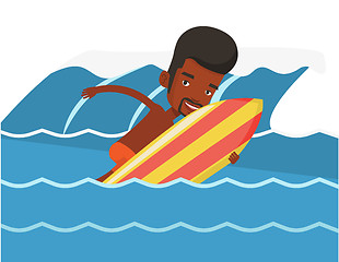 Image showing Happy surfer in action on a surf board.