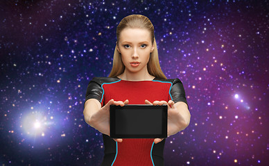 Image showing futuristic woman with tablet pc over space