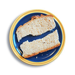 Image showing a slice of bread broken in two pieces