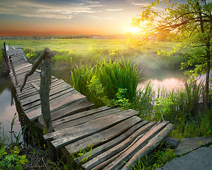 Image showing Old bridge through river