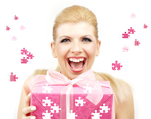 Image showing lucky blonde with puzzle gift box