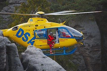 Image showing Rescue helicopter in the mountains