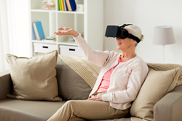 Image showing old woman in virtual reality headset or 3d glasses