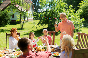 Image showing family gathering at summer garden and celebration