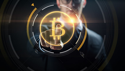 Image showing close up of businessman with bitcoin hologram