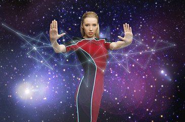 Image showing futuristic woman over planet and stars in space