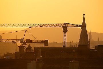 Image showing Construction cranes in the city