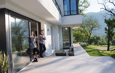 Image showing couple enjoying on the door of their luxury home villa