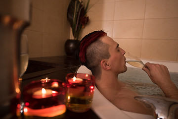 Image showing man relaxing in the jacuzzi