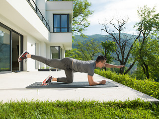 Image showing man doing morning yoga exercises