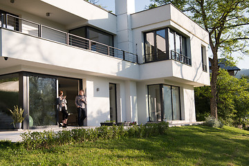 Image showing couple enjoying on the door of their luxury home villa