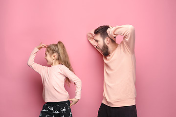 Image showing Young father with his baby daughter