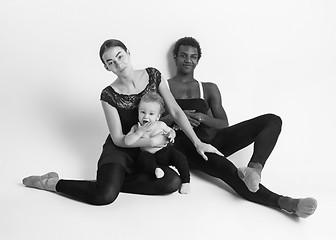 Image showing A happy family of ballet dancers on white studio background