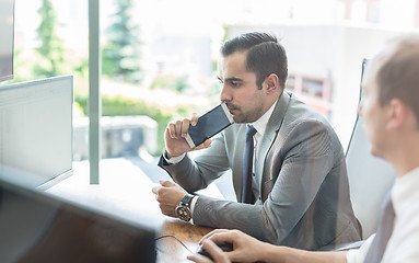 Image showing Business team analyzing data at business meeting.