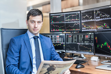 Image showing Business portrait of stock broker in traiding office.