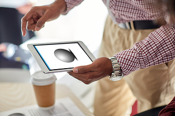 Image showing designer with image on tablet pc screen at office