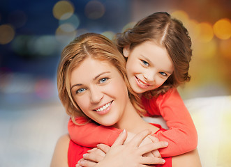 Image showing happy mother and daughter hugging