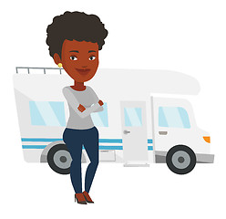 Image showing Woman standing in front of motor home.