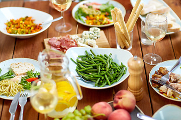 Image showing vegetable salad in bowl on wooden table