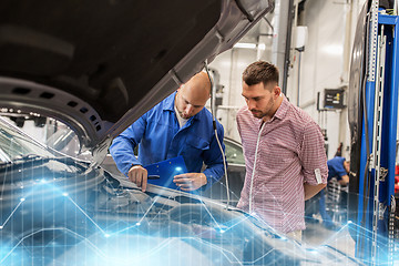 Image showing auto mechanic with clipboard and man at car shop