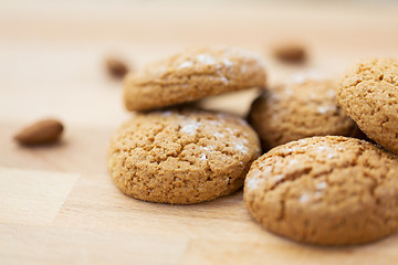 Image showing close up of oatmeal cookies on wooden table