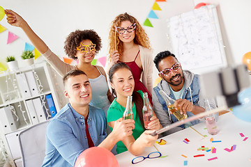 Image showing happy team taking selfie at office party