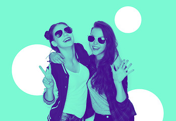 Image showing smiling teenage girls in sunglasses having fun