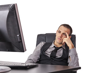 Image showing Tired Businessman in Front of His Computer