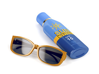 Image showing Sunglasses and sunscreen