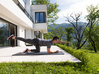 Image showing man doing morning yoga exercises