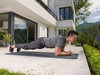 Image showing man doing morning yoga exercises