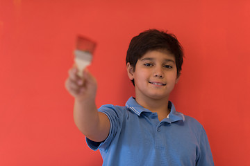 Image showing Portrait of a happy young boy painter