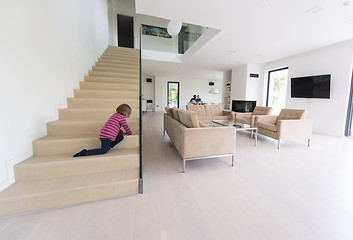 Image showing family with little girl enjoys in the modern living room