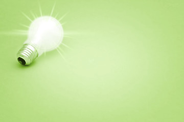 Image showing Background with lit lightbulb