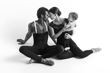 Image showing A happy family of ballet dancers on white studio background