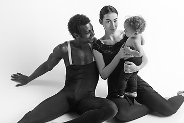 Image showing A happy family of ballet dancers on white studio background