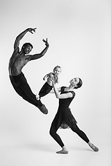 Image showing A happy family of ballet dancers on white studio background