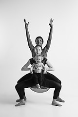 Image showing A happy family of ballet dancers on white studio background