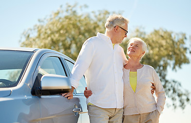 Image showing happy senior couple at car in summer