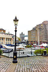 Image showing Old lantern and yachts in St Katharine Docks