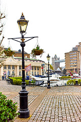 Image showing Old lantern and yachts in St Katharine Docks