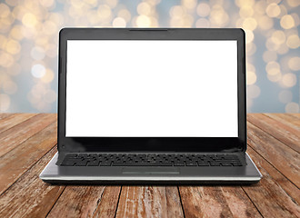 Image showing laptop computer with white screen over lights