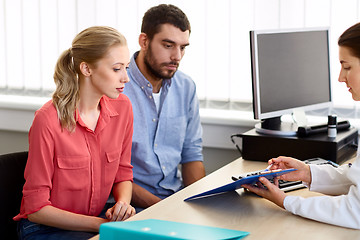 Image showing couple visiting doctor at family planning clinic