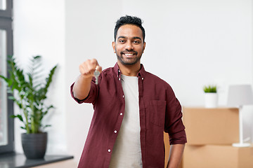 Image showing happy man with key moving to new home