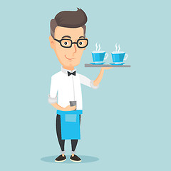 Image showing Waiter holding tray with cups of coffeee or tea.