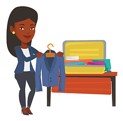 Image showing Woman packing her suitcase vector illustration.