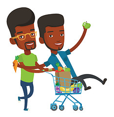 Image showing Two friends riding by shopping trolley.