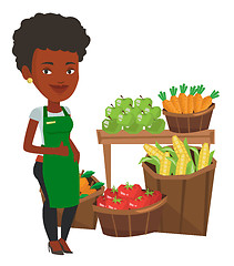 Image showing Friendly supermarket worker vector illustration.
