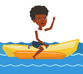 Image showing Tourists riding a banana boat vector illustration.